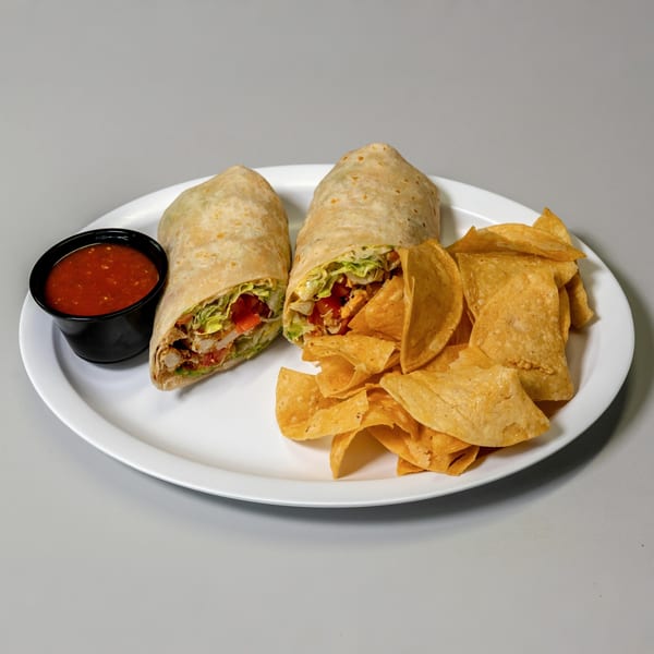 Two breakfast wraps with chicken, lettuce, and tomato, served with tortilla chips and salsa.